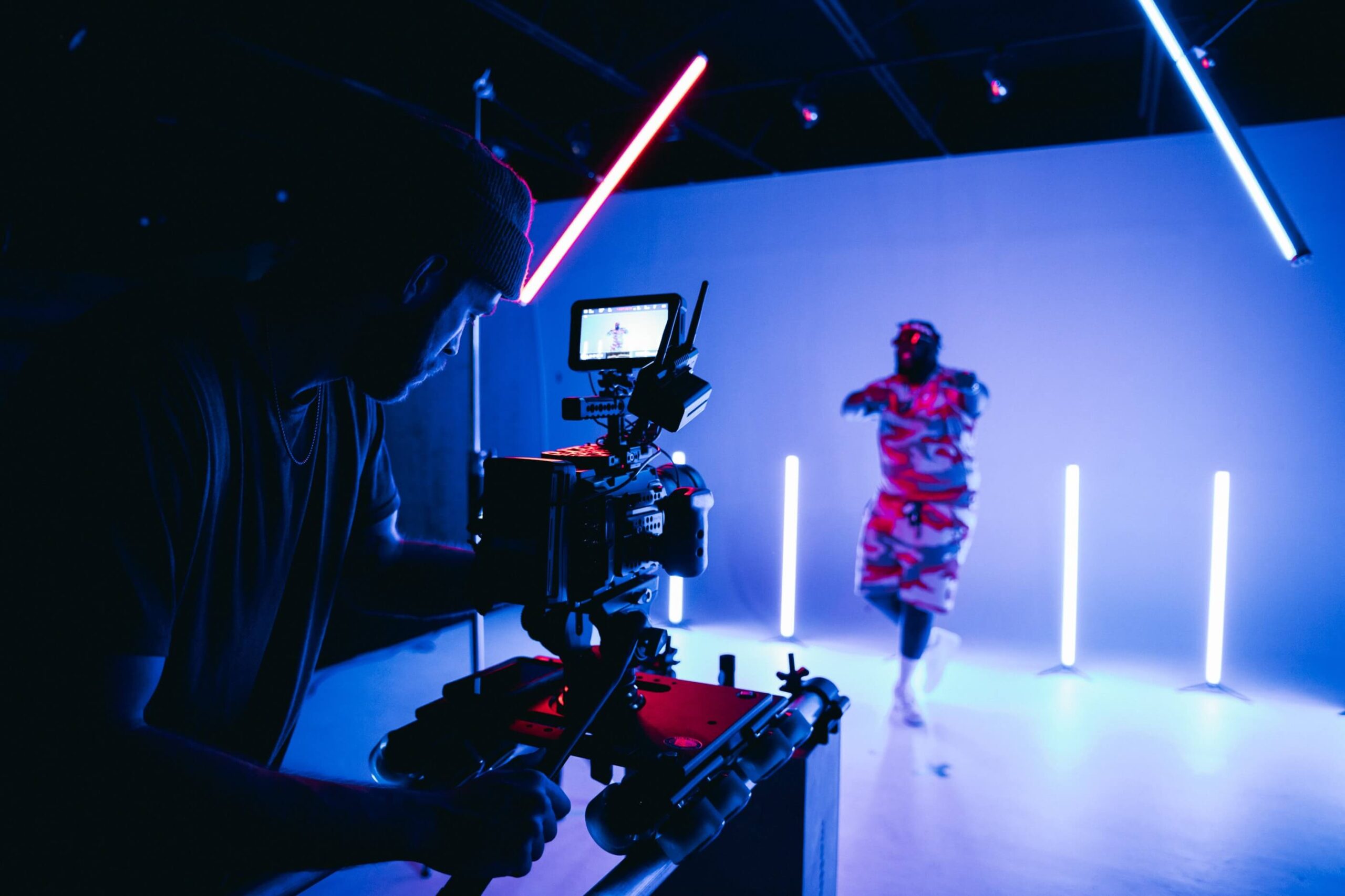 Video-shoot in a dark room with neon lights